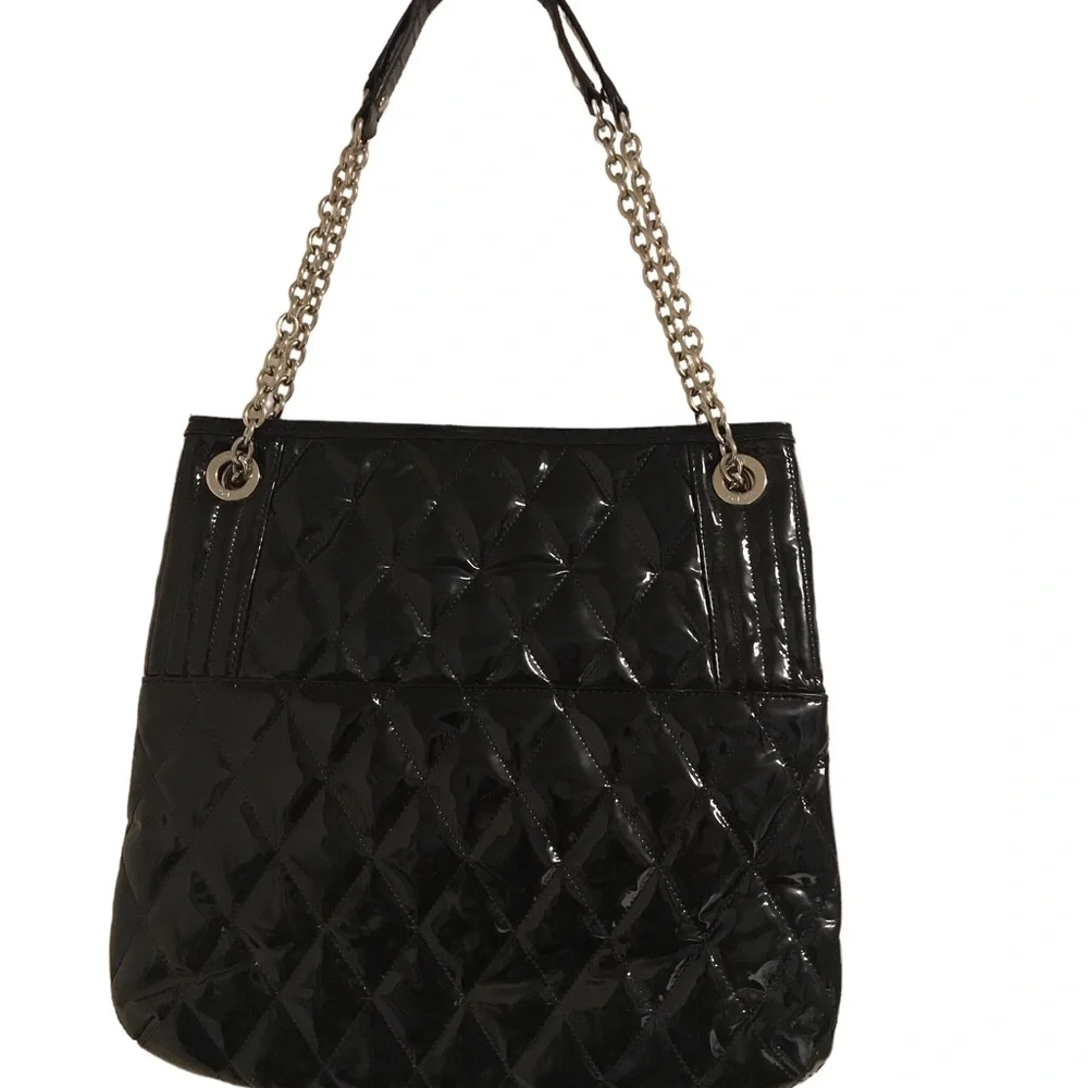 Coach black quilted patent leather handbag